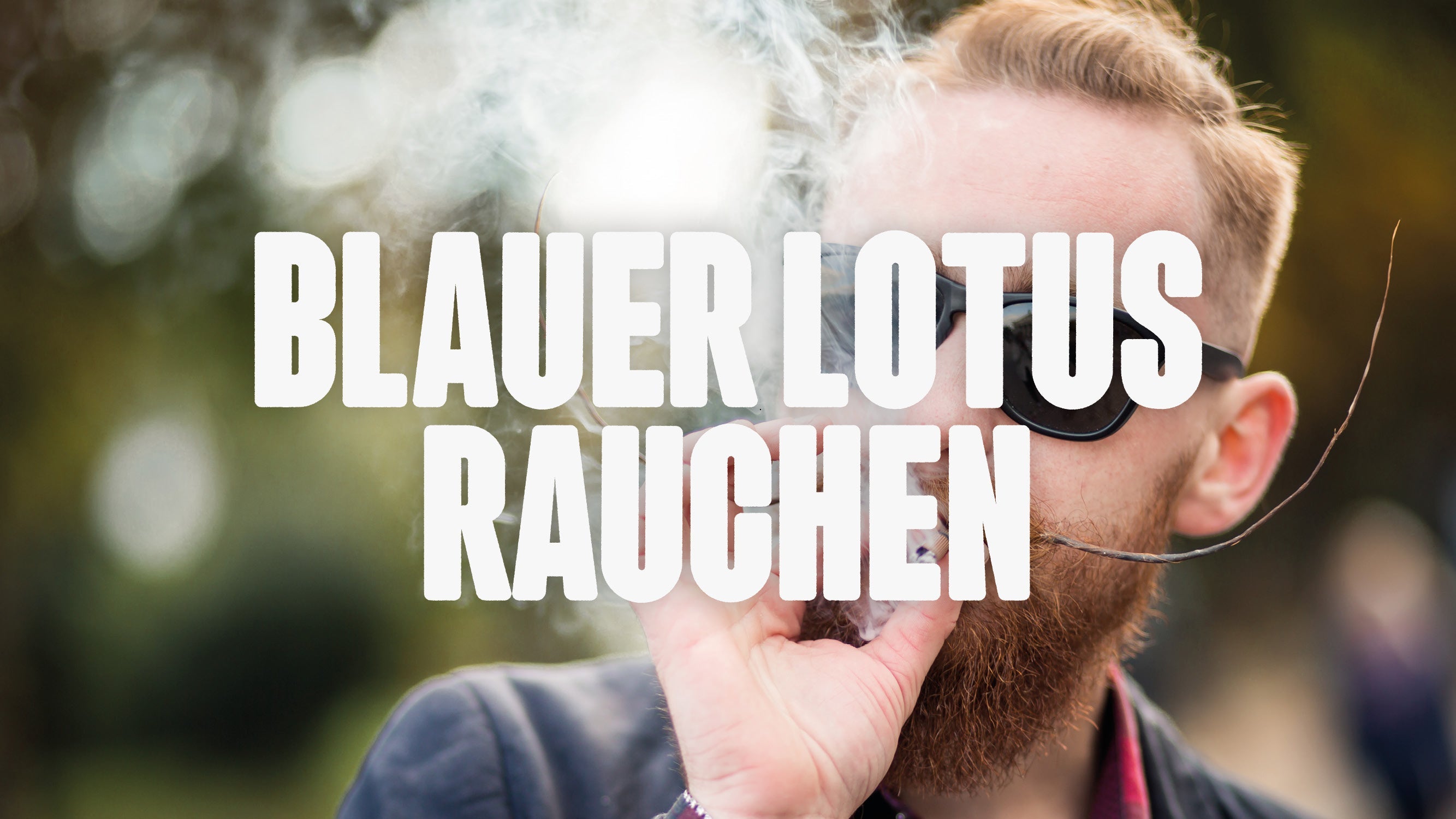 Bild von Mann mit Vollbart mit Sonnenbrille der raucht